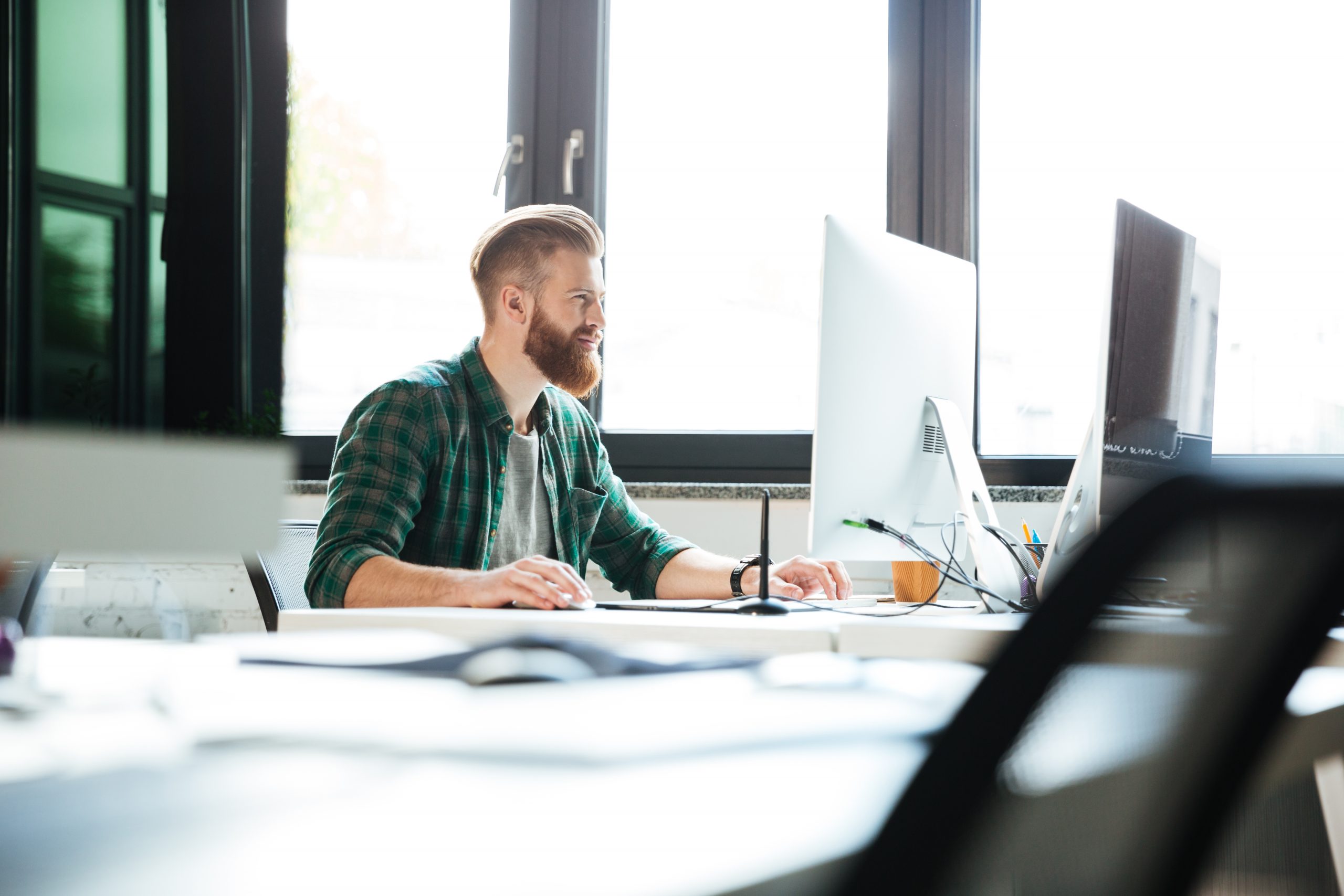 Engineer working in office on a computer